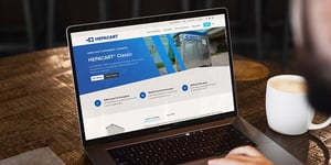 B2B product website design showcased on a laptop, highlighting manufacturing and industrial equipment marketing by TANK New Media.